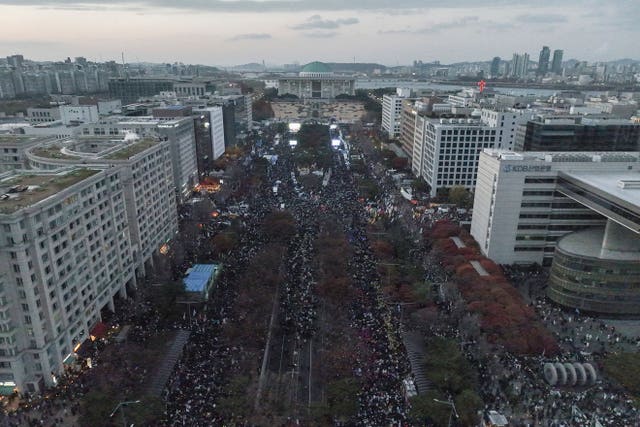 Protesters stage a rally demanding South Korean President Yoon Suk Yeol’s impeachment