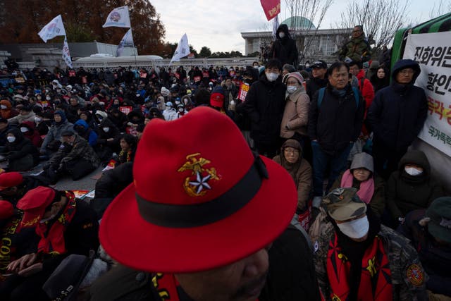 People gathered outside the National Assembly