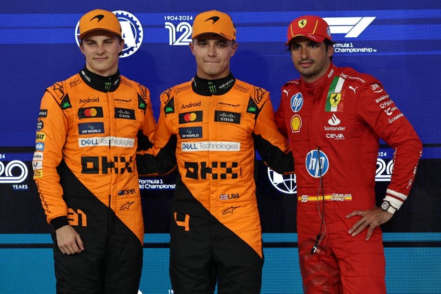 Piastri, Norris and Sainz stand together after qualifying