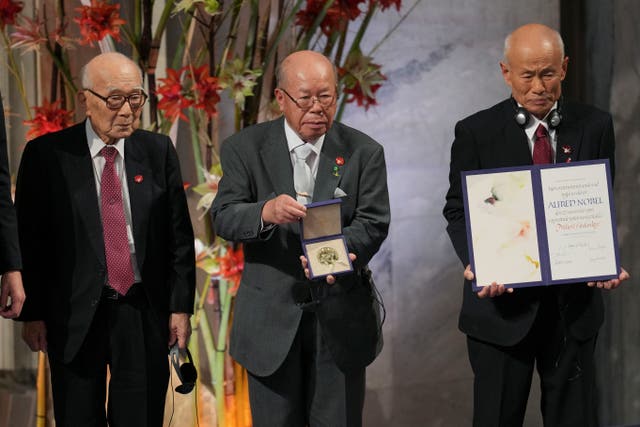 Terumi Tanaka, Shigemitsu Tanaka and Toshiyuki Mimaki, from left, representatives of this year’s Nobel Peace Prize winner Nihon Hidankyo