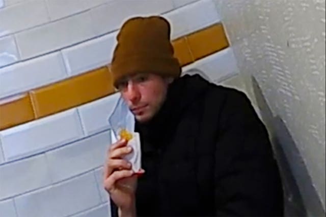 Still from a video of Luigi Mangione at a McDonald’s