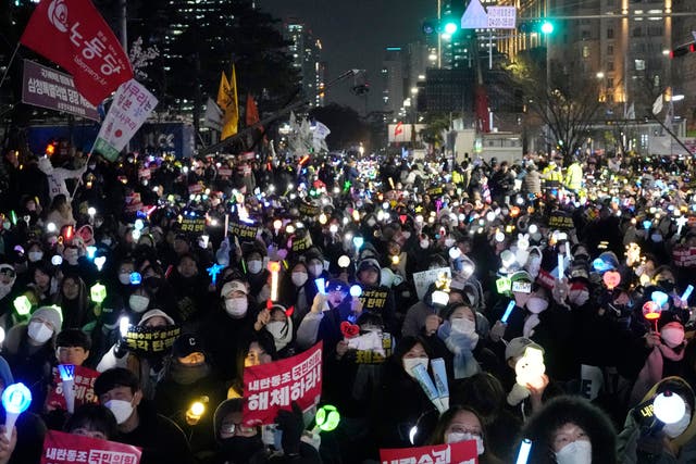 A rally demanding South Korean President Yoon Suk Yeol’s impeachment, outside the National Assembly in Seoul