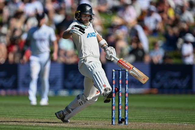 New Zealand batsman Kane Williamson attempts to kick the ball away from his stumps as he is bowled by Matthew Potts