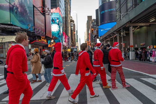 People dressed as Father Christmas