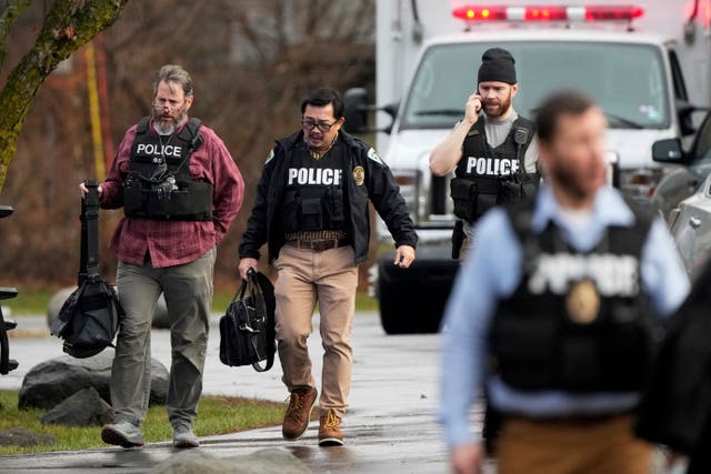 Police with bullet-proof vests