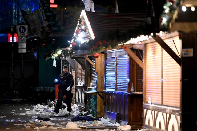 A police officer in the Christmas market