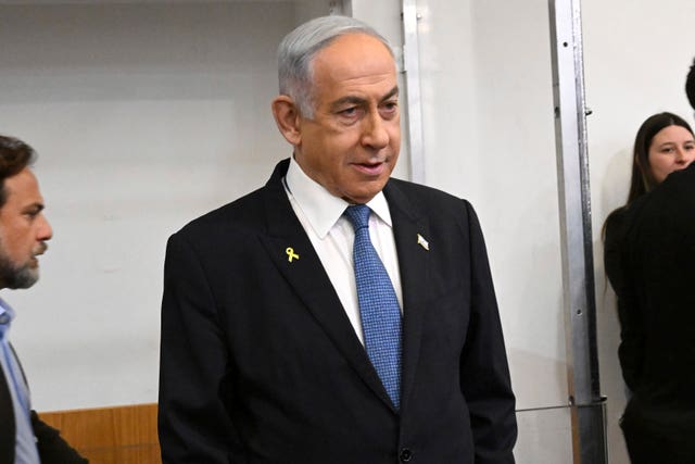 Benjamin Netanyahu in a suit and tie