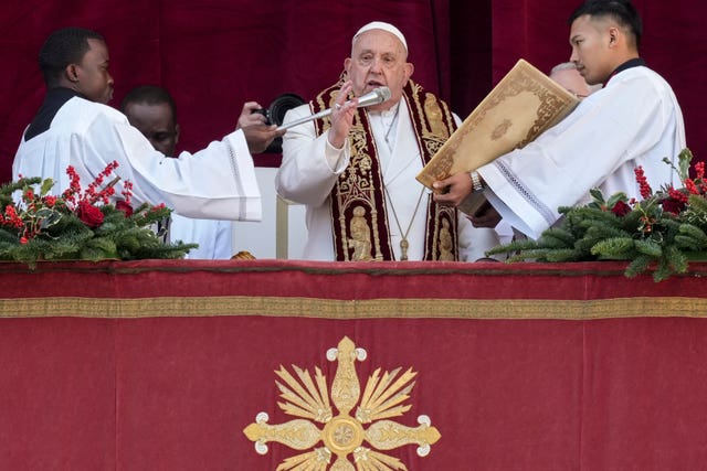 Pope Francis delivers the Urbi et Orbi (Latin for ‘to the city and to the world’ ) Christmas’ day blessing from the main balcony of St Peter’s Basilica at the Vatican