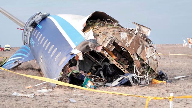 The wreckage of Azerbaijan Airlines Embraer 190 lies on the ground near the airport of Aktau, Kazakhstan