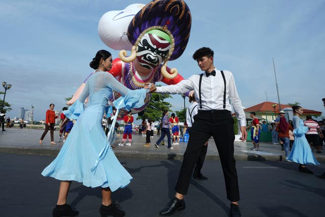 Cambodian dancers perform during the Celebrating Cambodia event as part of New Year’s Eve in front of the Royal Palace in Phnom Penh