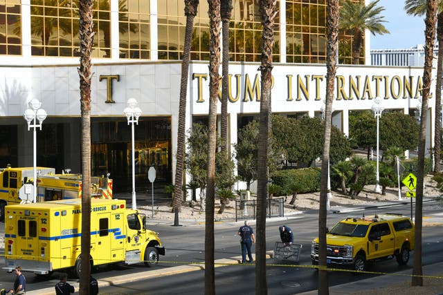 Fire crews work outside Trump International Hotel in Las Vegas after the fire and explosion of a Tesla Cybertruck