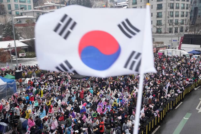 Supporters of impeached South Korean President Yoon Suk Yeol stage a rally to oppose his impeachment near the presidential residence