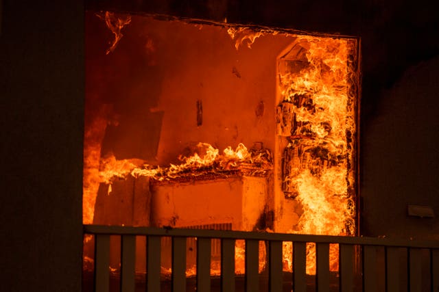 A house burning in the Eaton Fire in Altadena, California