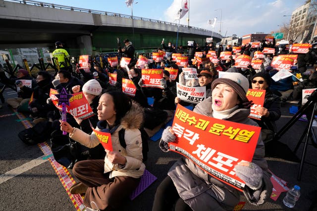 Protesters attend a rally demanding the arrest of impeached South Korean President Yoon Suk Yeol 