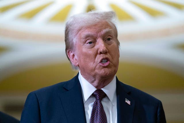 President-elect Donald Trump talks to reporters after a meeting with Republican leadership at the Capitol in Washington