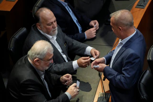 Hezbollah’s parliamentary bloc members attend the parliamentary session 