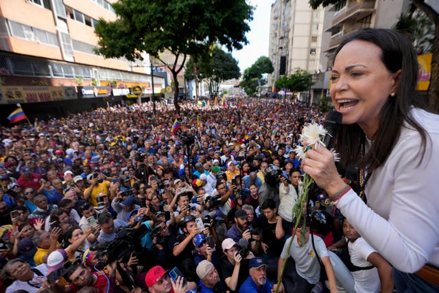 Maria Corina Machado addresses supporters during a protest against President Nicolas Maduro