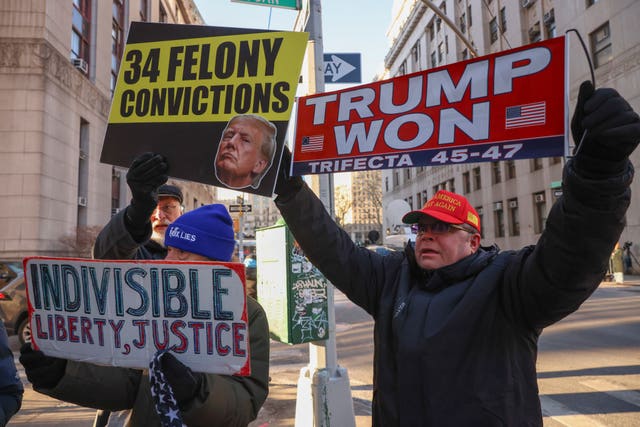 Demonstrators protest outside Manhattan criminal court before the start of the sentencing in President-elect Donald Trump’s hush money case in New York