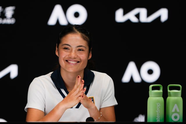 Emma Raducanu smiles during a press conference