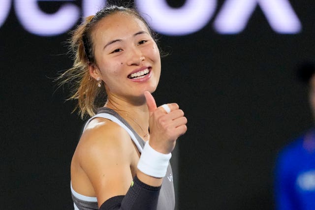 Zheng Qinwen gives a thumbs up after her victory