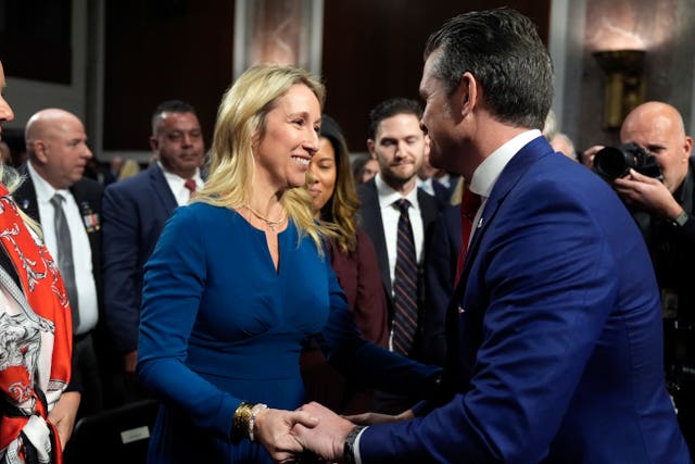 Jennifer Rauchet hugs her husband Pete Hegseth, President-elect Donald Trump’s choice to be defence secretary, after his Senate Armed Services Committee confirmation hearing at the Capitol in Washington