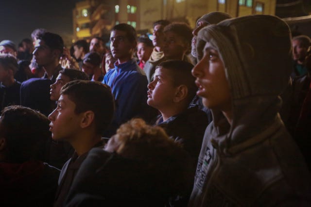 Palestinians watching TV as they awaited the announcement of the ceasefire deal between Hamas and Israel