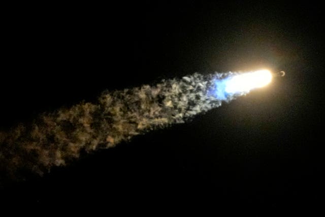 A SpaceX Falcon 9 rocket lifts off from pad 39A with a payload of a pair of lunar landers at the Kennedy Space Center in Cape Canaveral