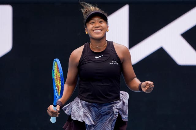 Naomi Osaka celebrates beating Karolina Muchova