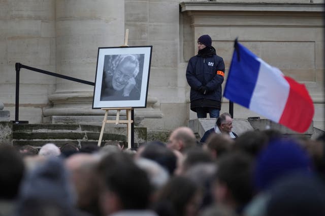 A portrait of late far-right leader Jean-Marie Le Pen outside Notre Dame du Val-de-Grace church