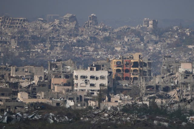 Buildings destroyed by Israeli bombardments inside the Gaza Strip