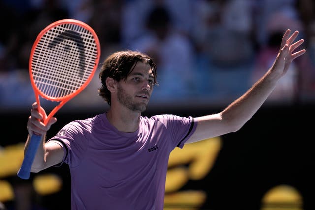 Taylor Fritz celebrates beating Cristian Garin