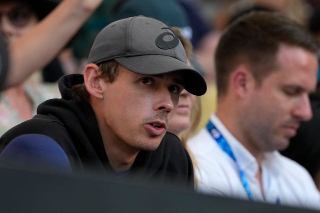 Alex De Minaur watches his fiancee Katie Boulter