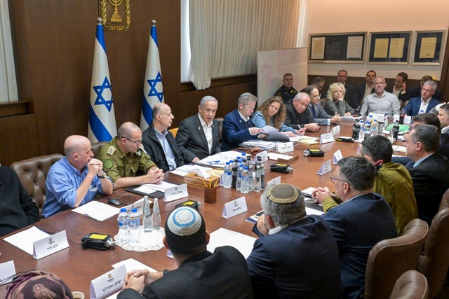 Israeli Prime Minister Benjamin Netanyahu, centre, with his security Cabinet