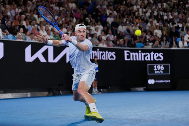 Jack Draper stretches for a backhand