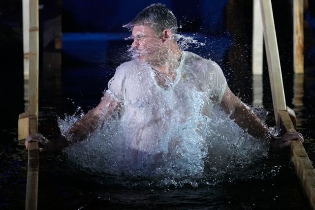 A man shaking off water