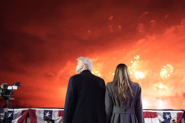 President-elect Donald Trump, Melania Trump and family watch fireworks at Trump National Golf Club