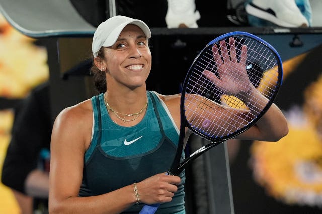 Madison Keys hitting her racket