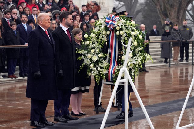 President-elect Donald Trump and vice president-elect JD Vance participate in a wreath-laying ceremony at Arlington National Cemetery in Arlington, Virginia