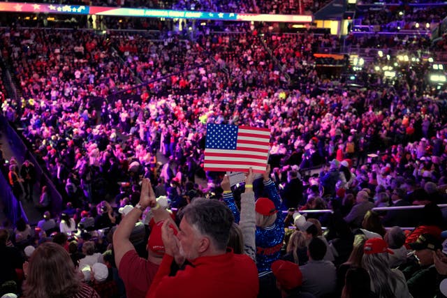 Attendees cheer before President-elect Donald Trump arrives at a rally ahead of the 60th presidential inauguration in Washington