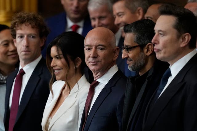 Guests including Mark Zuckerberg, Jeff Bezos, Sundar Pichai and Elon Musk arrive before the 60th Presidential Inauguration in the Rotunda of the US Capitol in Washington