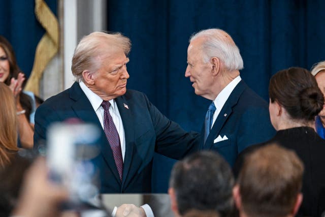 President-elect Donald Trump, left, greets President Joe Biden at the 60th Presidential Inauguration in the Rotunda of the US Capitol in Washington