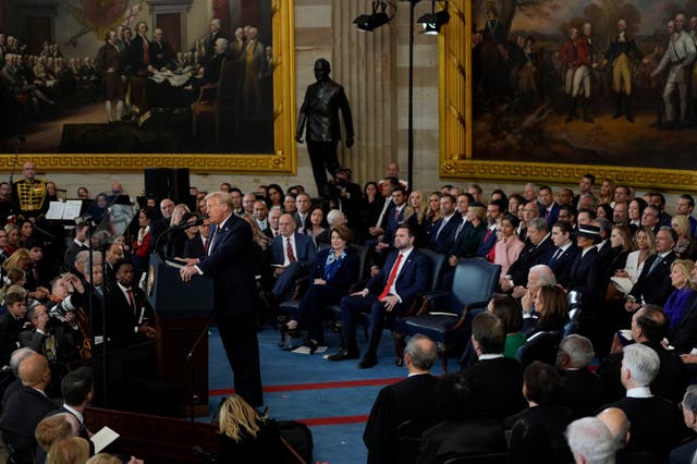 President Donald Trump gives his inaugural address during the 60th Presidential Inauguration in the Rotunda of the US Capitol in Washington 