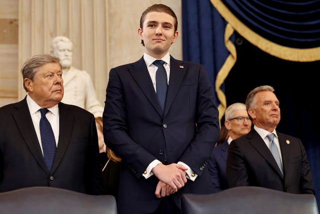 Barron Trump arrives before the 60th Presidential Inauguration in the Rotunda of the US Capitol in Washington