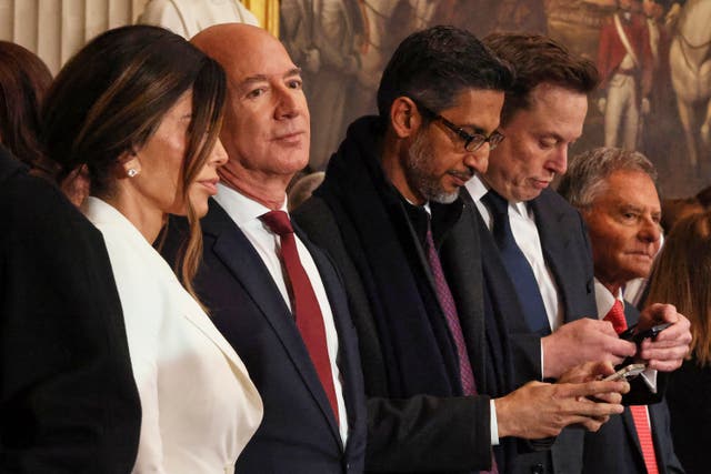 From left, Lauren Sanchez, Jeff Bezos, Sundar Pichai and Elon Musk in the Rotunda of the US Capitol in Washington