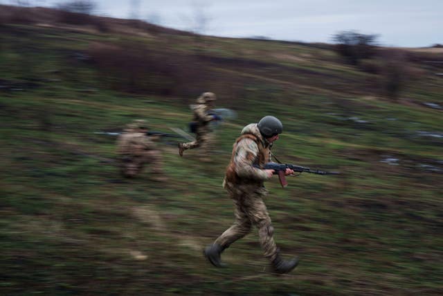 Ukrainian servicemen of 24th Mechanised Brigade train not far from the front line in the Donetsk region, Ukraine 