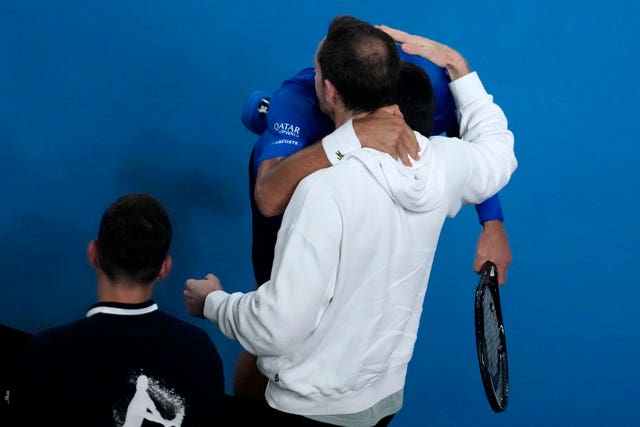 Novak Djokovic and Andy Murray embrace