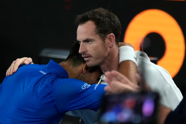 Novak Djokovic, left, hugs coach Andy Murray after beating Carlos Alcaraz 