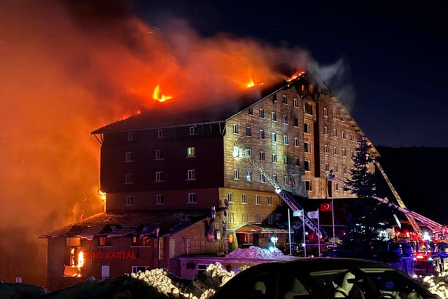 The hotel in flames