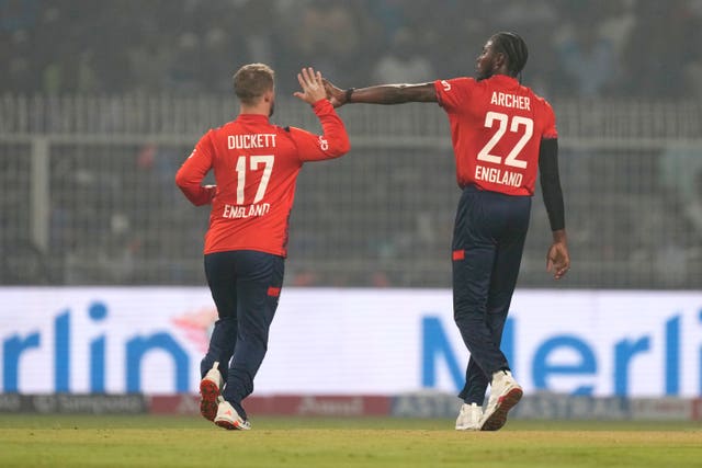 Jofra Archer, right, celebrates the wicket of Suryakumar Yadav 