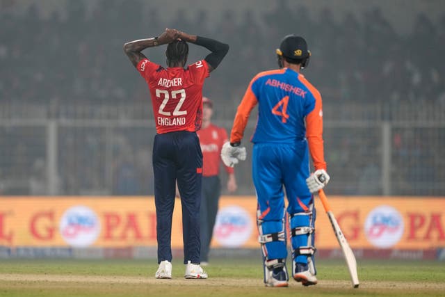 Jofra Archer with hands on his head